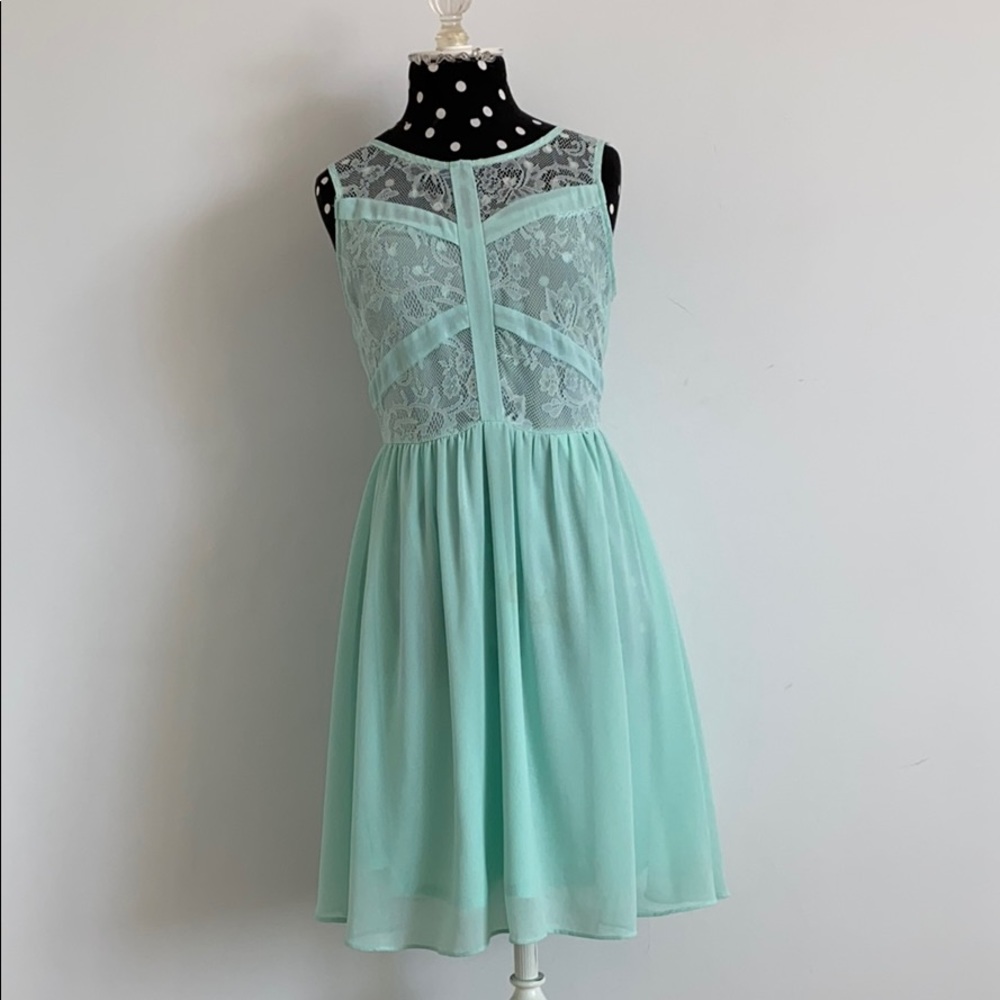 Teal dress with lace bodice